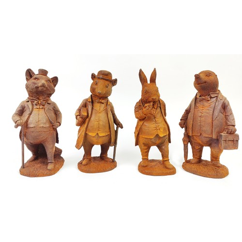 450 - CAST METAL CHARACTERS FROM WIND IN THE WILLOWS, a set of four, 29cm H at largest. (4)