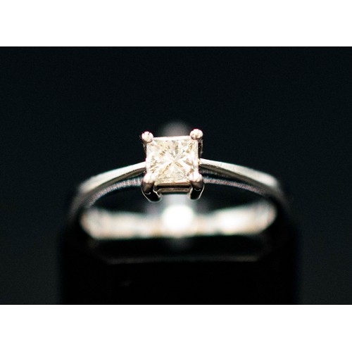 26 - CERTIFICATED PLATINUM PRINCESS-CUT DIAMOND SOLITAIRE RING, boxed, diamond 0.33ct/F. Cert no. WGI9634... 