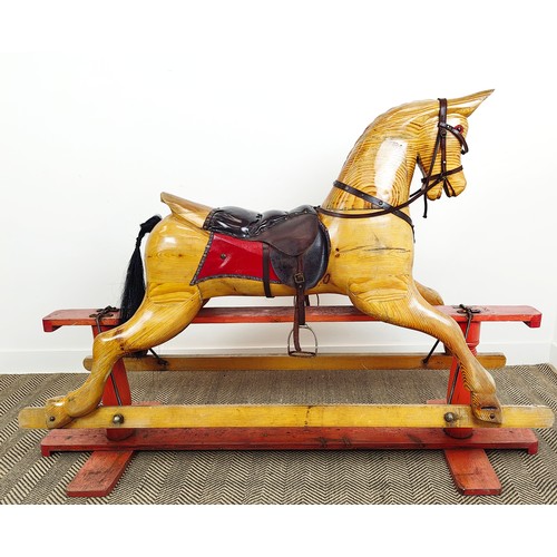 142 - ROCKING HORSE, vintage pine and leather on painted base, 126cm H x 183cm L x 56cm W.