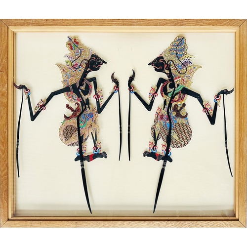 151 - JAVANESE SHADOW PUPPET STYLE CARTOON, hinged and framed, 94cm W x 79cm H.