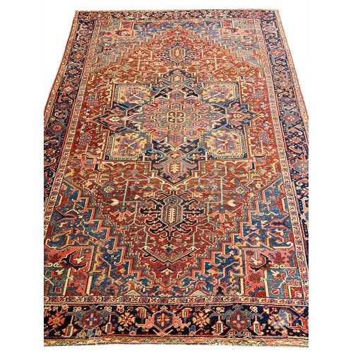 79 - ANTIQUE PERSIAN HERIZ CARPET, 345cm x 246cm.