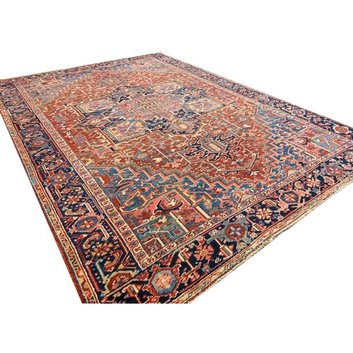 79 - ANTIQUE PERSIAN HERIZ CARPET, 345cm x 246cm.