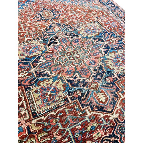 79 - ANTIQUE PERSIAN HERIZ CARPET, 345cm x 246cm.