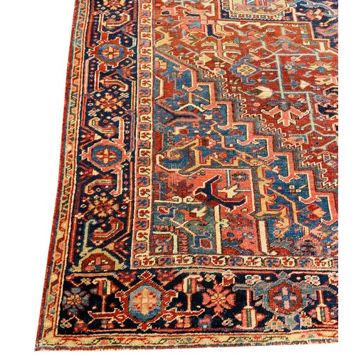 79 - ANTIQUE PERSIAN HERIZ CARPET, 345cm x 246cm.