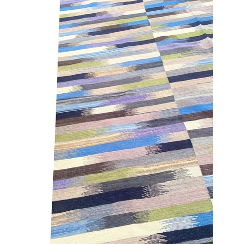 101 - CONTEMPORARY RUFARSHI KILIM, 284cm x 250cm.