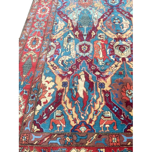 105 - ANTIQUE CAUCASIAN DRAGON DESIGN CARPET, 355cm x 250cm.