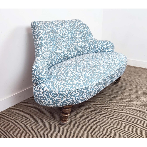 175 - SOFA, Victorian in blue and white patterned material on later chrome castors, 85cm H x 144cm W.