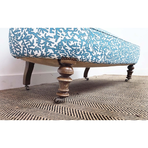 175 - SOFA, Victorian in blue and white patterned material on later chrome castors, 85cm H x 144cm W.