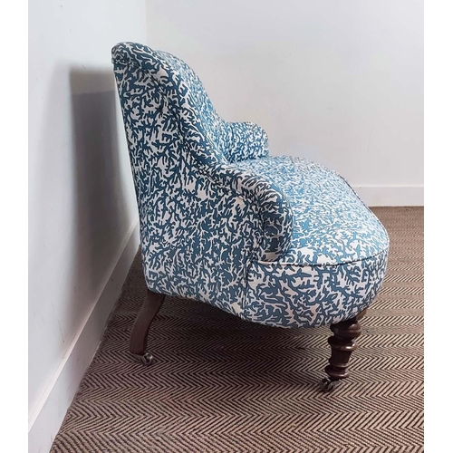 175 - SOFA, Victorian in blue and white patterned material on later chrome castors, 85cm H x 144cm W.