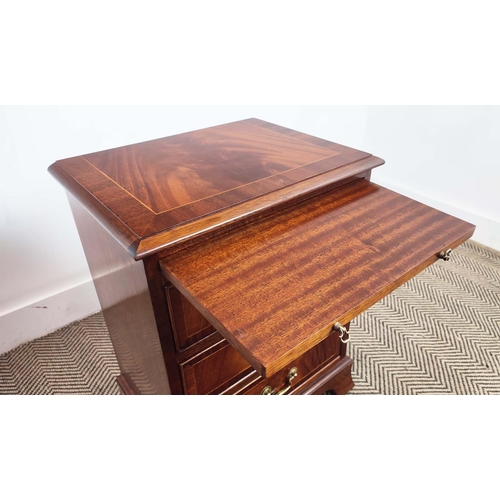 179 - BEDSIDE CHESTS, a pair, Georgian style crossbanded mahogany, each with brushing slide above three dr... 