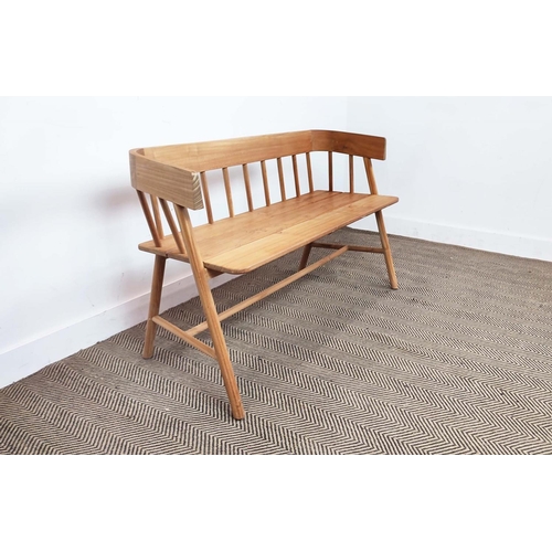 410 - BENCH, wooden with spindle back raised on stretchered supports, 75cm H x 126cm W x 45cm D.