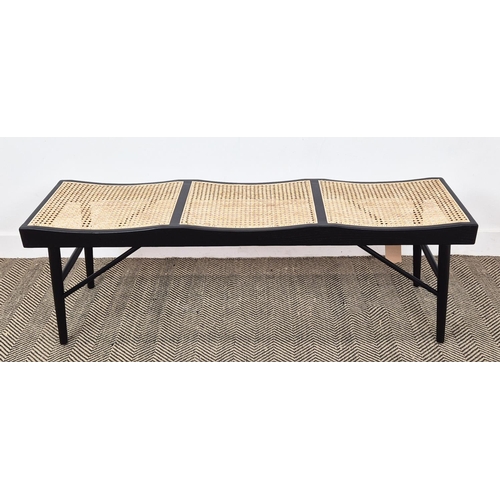 411 - BENCH, ebonised with three caned seats, 47cm H x 140cm W x 38cm D