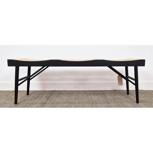 411 - BENCH, ebonised with three caned seats, 47cm H x 140cm W x 38cm D