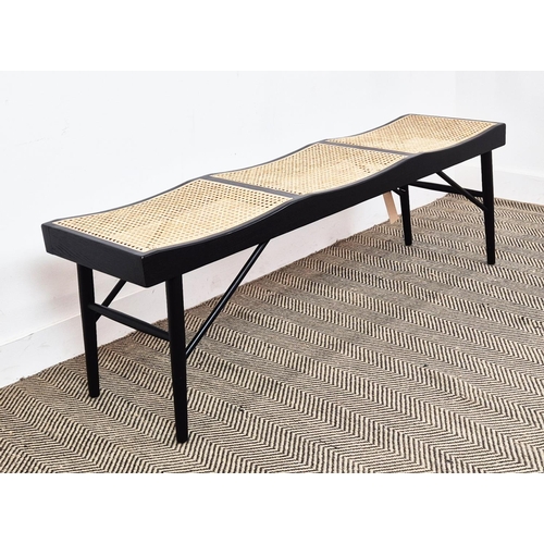 411 - BENCH, ebonised with three caned seats, 47cm H x 140cm W x 38cm D