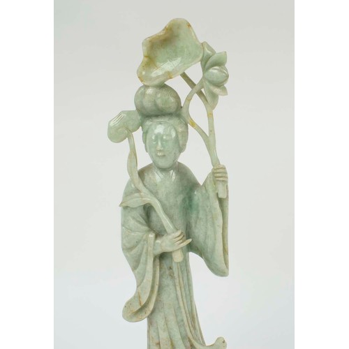 1 - A CHINESE JADEITE FIGURE OF AN IMMORTAL, 19th/20th century, carved holding a lotus leaf, 40cm H.