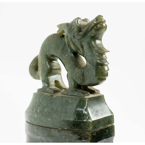 3 - SPINACH JADE LIDDED DRAGON VASES, a pair, with carved dragon detail on carved bases, 28cm H.