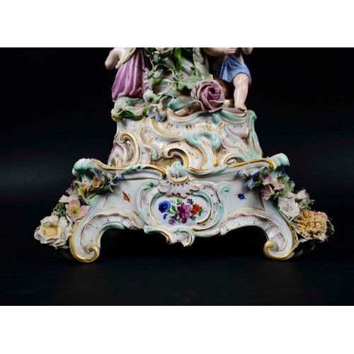 15 - MEISSEN CENTRE PIECE, 19th century comport on stand, with foliate decoration and two putti playing i... 