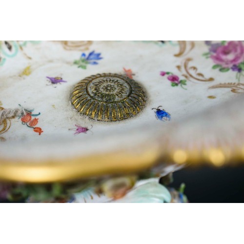 15 - MEISSEN CENTRE PIECE, 19th century comport on stand, with foliate decoration and two putti playing i... 