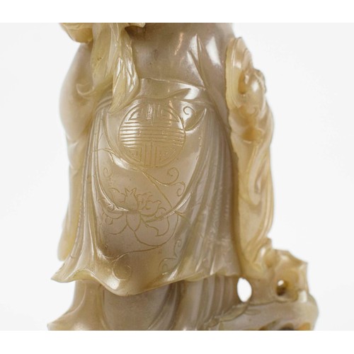 2 - A CHINESE JADE SHOU LAO CARVING, 18th/19th century, with peach vine and boy standing on vessel point... 