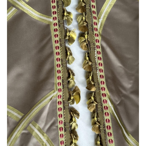 119 - CURTAINS, a pair, double sided and interlined taupe silk and trellis, interwoven with tassel contras... 