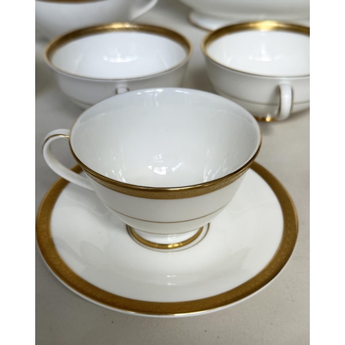 125 - DINNER SERVICE, English Fine Bone China Royal Doulton 'Royal Gold', a large dinner service including... 