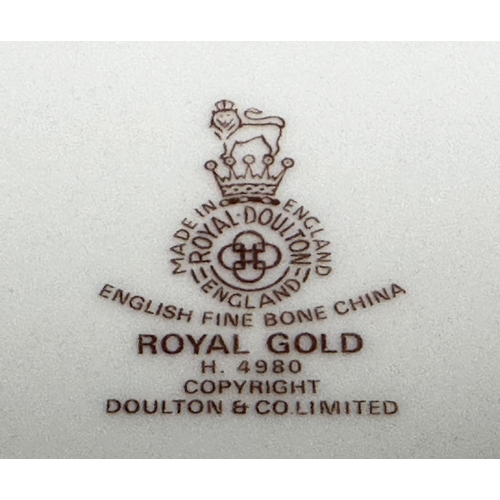 125 - DINNER SERVICE, English Fine Bone China Royal Doulton 'Royal Gold', a large dinner service including... 