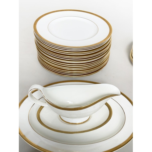 125 - DINNER SERVICE, English Fine Bone China Royal Doulton 'Royal Gold', a large dinner service including... 