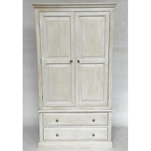 129 - ARMOIRE, French style traditionally grey painted, with twin panelled doors enclosing hanging space a... 