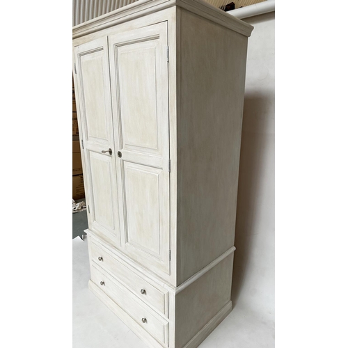 129 - ARMOIRE, French style traditionally grey painted, with twin panelled doors enclosing hanging space a... 