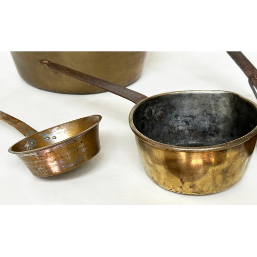 137 - EARLY COPPERWARE/KITCHENWARE, a 19th century brass preserving pan, three saucepans and six lids and ... 