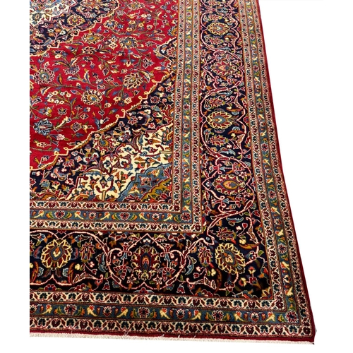 97 - FINE PERSIAN KASHAN CARPET, 398cm x 294cm.