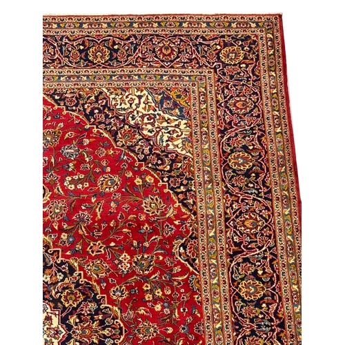 97 - FINE PERSIAN KASHAN CARPET, 398cm x 294cm.