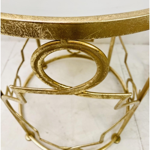 388 - SIDE TABLES, a graduated set of two, gilt metal with circular mirrored tops, larger 56cm H x 46cm. (... 