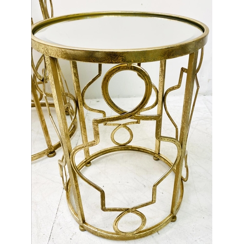 388 - SIDE TABLES, a graduated set of two, gilt metal with circular mirrored tops, larger 56cm H x 46cm. (... 