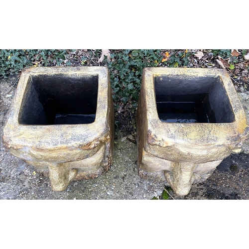 393 - FACE PLANTERS, a pair, Classical design in a gilt resin, 45cm H x 36cm x 35cm. (2)