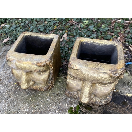 393 - FACE PLANTERS, a pair, Classical design in a gilt resin, 45cm H x 36cm x 35cm. (2)