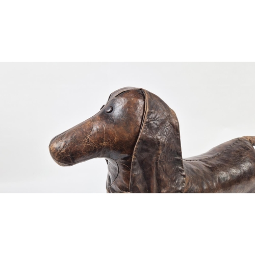 11 - SAUSAGE DOG, in leather liberty style, 76cm nose to tail.