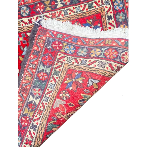 154 - NORTH WEST PERSIAN KARAJA LONG RUNNER, 770cm x 90cm.