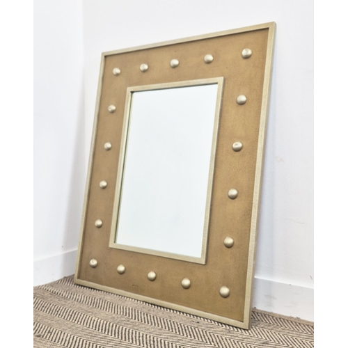 176 - LOOKING GLASS, of gilt finish and hemispherical decoration, 107cm x 84cm.