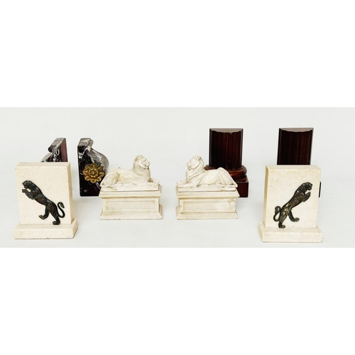 181 - DESK BOOKENDS, a pair, lions on plinths, together with three pairs of bookends, one pair wooden colu... 