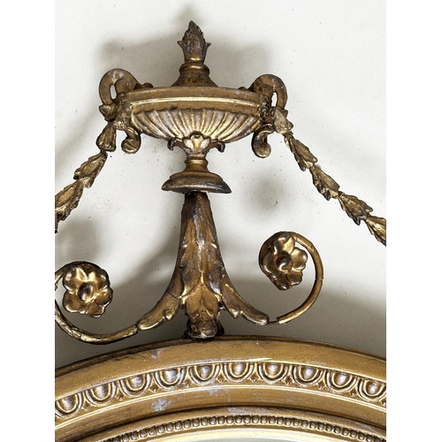 183 - ADAM STYLE MIRROR, early 20th century Robert Adam style giltwood and gesso, circular with bell husk ... 