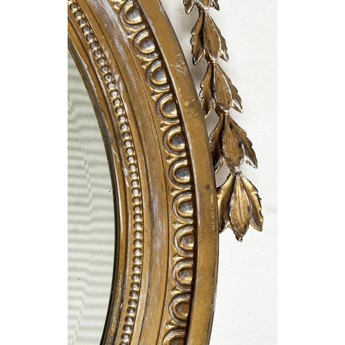 183 - ADAM STYLE MIRROR, early 20th century Robert Adam style giltwood and gesso, circular with bell husk ... 