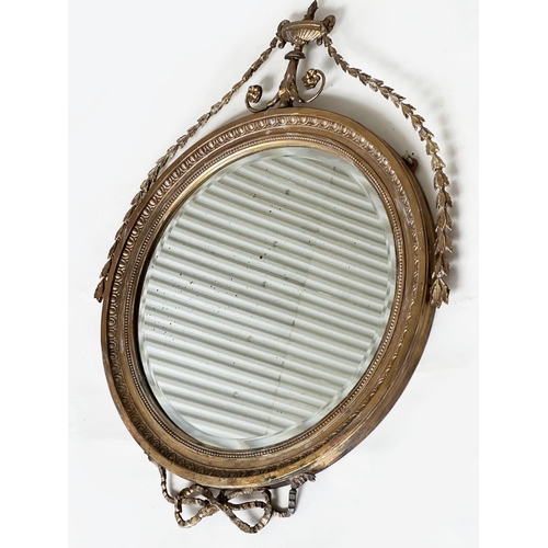 183 - ADAM STYLE MIRROR, early 20th century Robert Adam style giltwood and gesso, circular with bell husk ... 