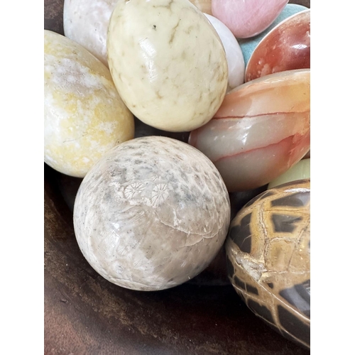 188 - MARBLE EGGS, specimen marbles in a turned wooden bowl, approx 12, largest 7cm H, bowl 28cm D.