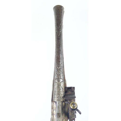 19 - PERSIAN FLINTLOCK PISTOL, 18th/19th century with steel barrel and decorative silver inlay allover al... 