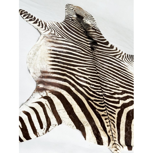 190 - ZEBRA RUG, late 19th century/early 20th century, 290cm x 194cm approx.