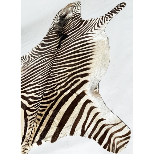 190 - ZEBRA RUG, late 19th century/early 20th century, 290cm x 194cm approx.