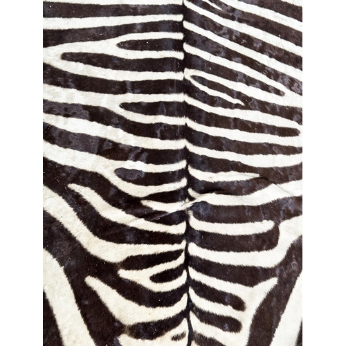 190 - ZEBRA RUG, late 19th century/early 20th century, 290cm x 194cm approx.