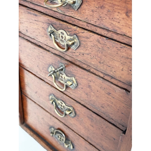 225 - WATCHMAKERS CABINET, 19th century mahogany with six graduated drawers, locking stiles and an impress... 