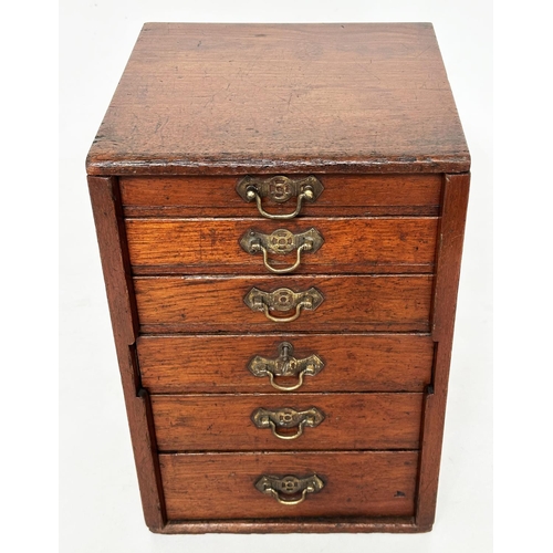 225 - WATCHMAKERS CABINET, 19th century mahogany with six graduated drawers, locking stiles and an impress... 